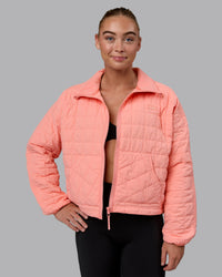 Woman wearing Thrive Packable Jacket - Murex Shell