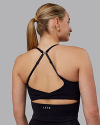 Woman wearing Twist Shelf Bra Tank - Black