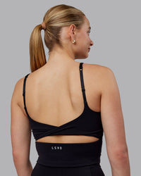 Woman wearing Twist Shelf Bra Tank - Black
