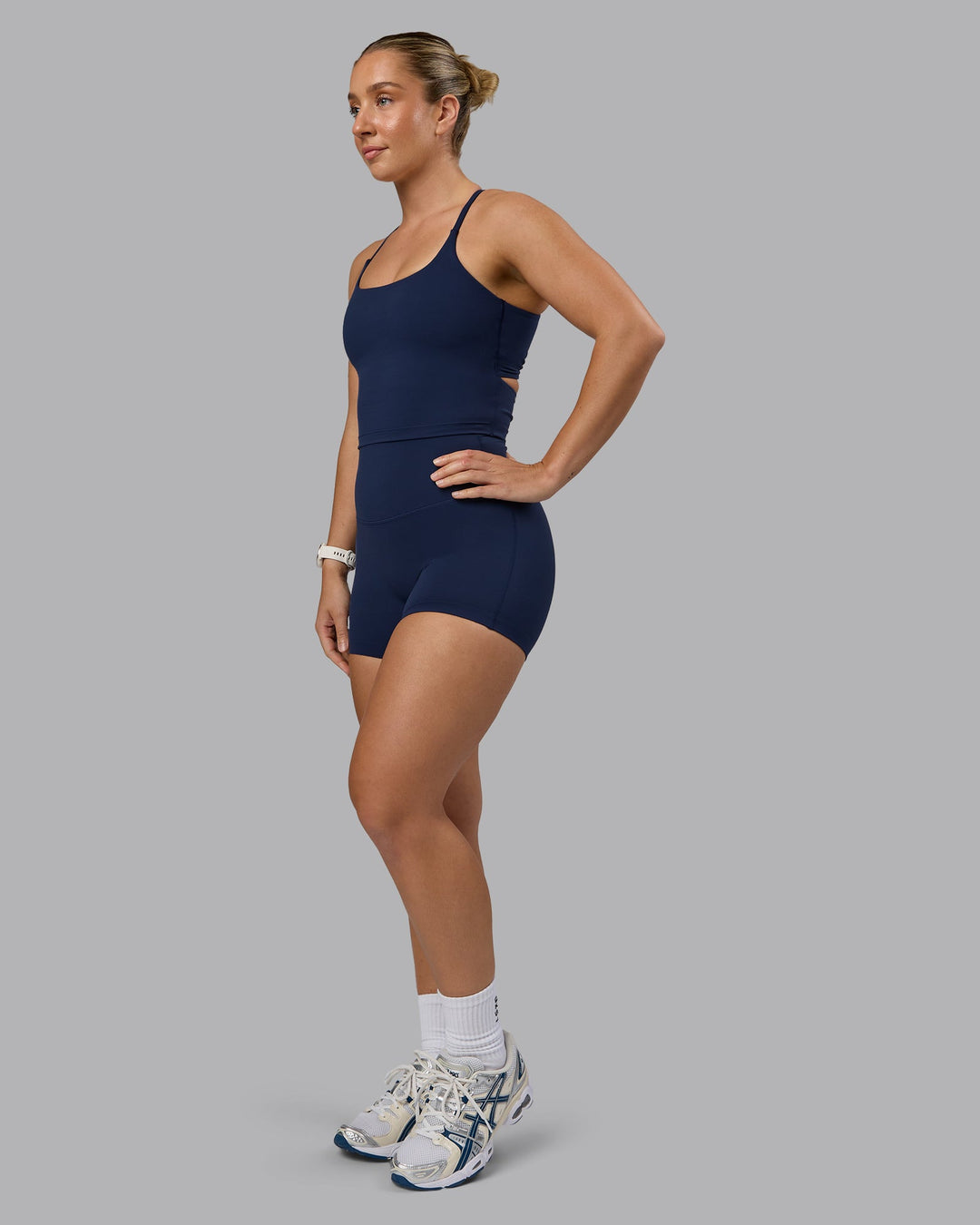 Woman wearing Twist Shelf Bra Tank - Future Navy