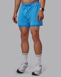 Man wearing UltraAir 5" Lined Performance Shorts - Azure Blue