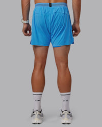 Man wearing UltraAir 5" Lined Performance Shorts - Azure Blue