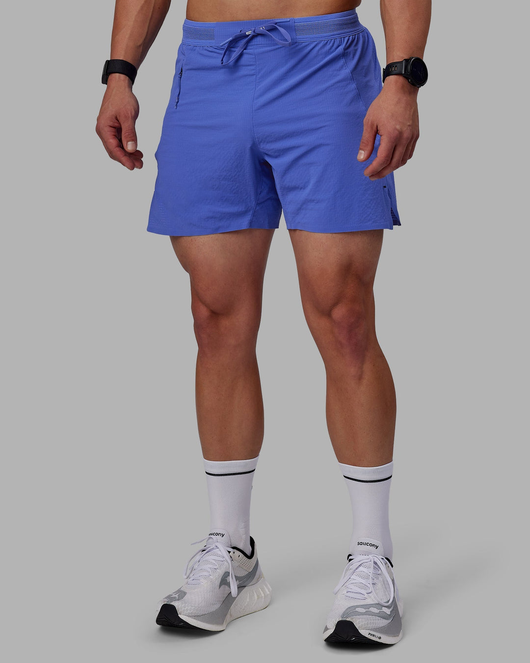 Man wearing UltraAir 5&quot; Lined Performance Shorts - Baja Blue-Reflective