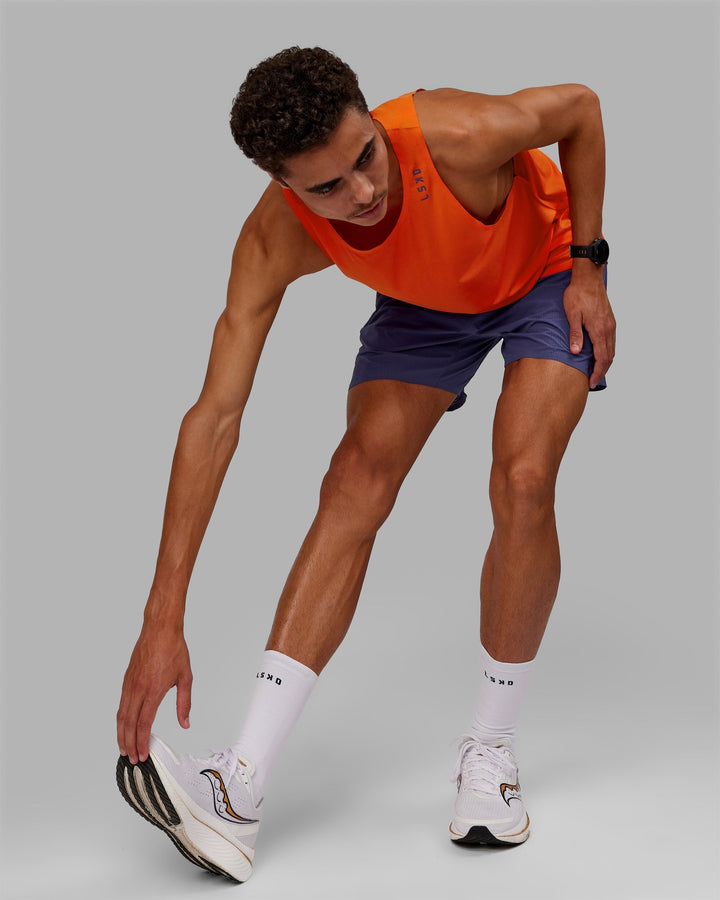 Man wearing UltraAir 5" Lined Performance Shorts - Future Dusk-Reflective
