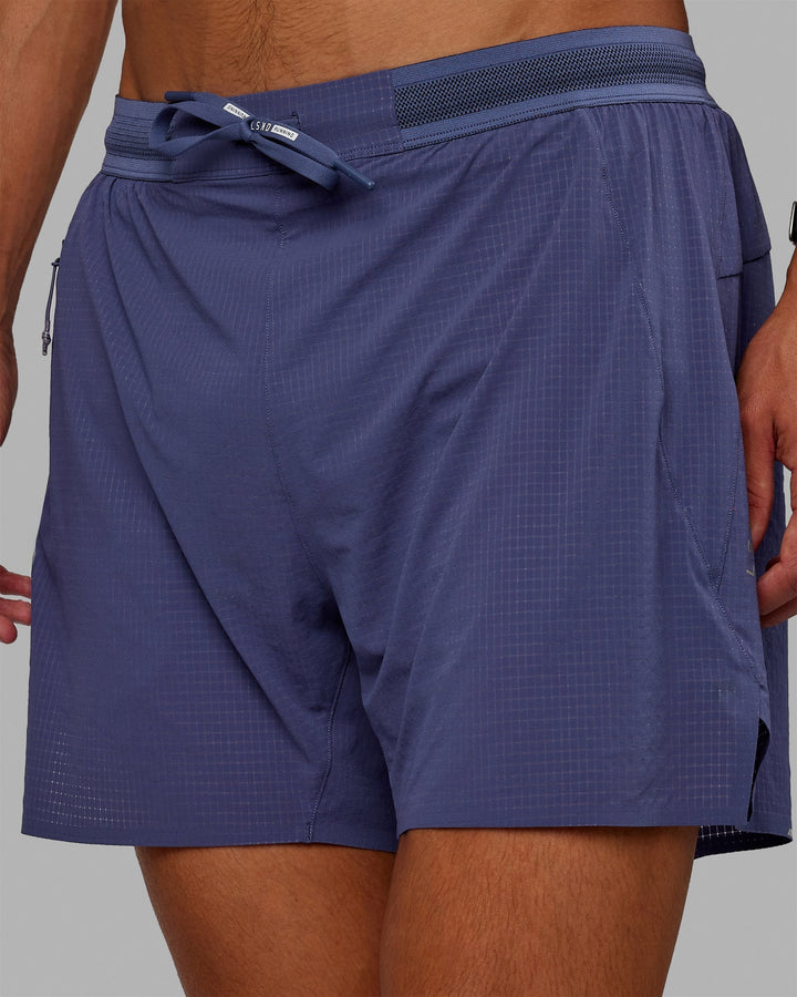 Man wearing UltraAir 5" Lined Performance Shorts - Future Dusk-Reflective