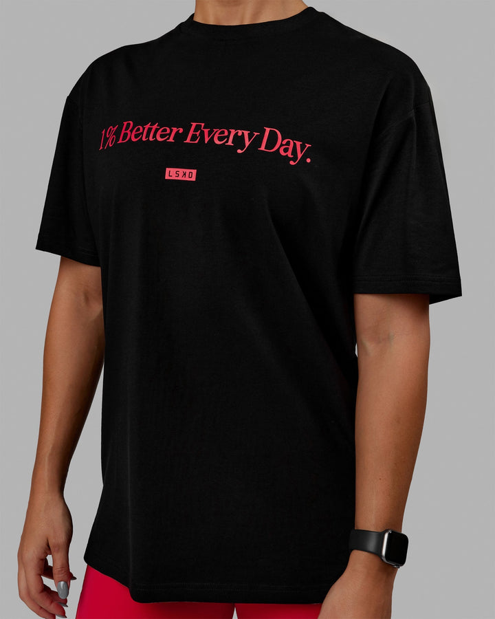 Woman wearing Unisex 1% Better FLXCotton Tee Oversize - Black-Scarlet