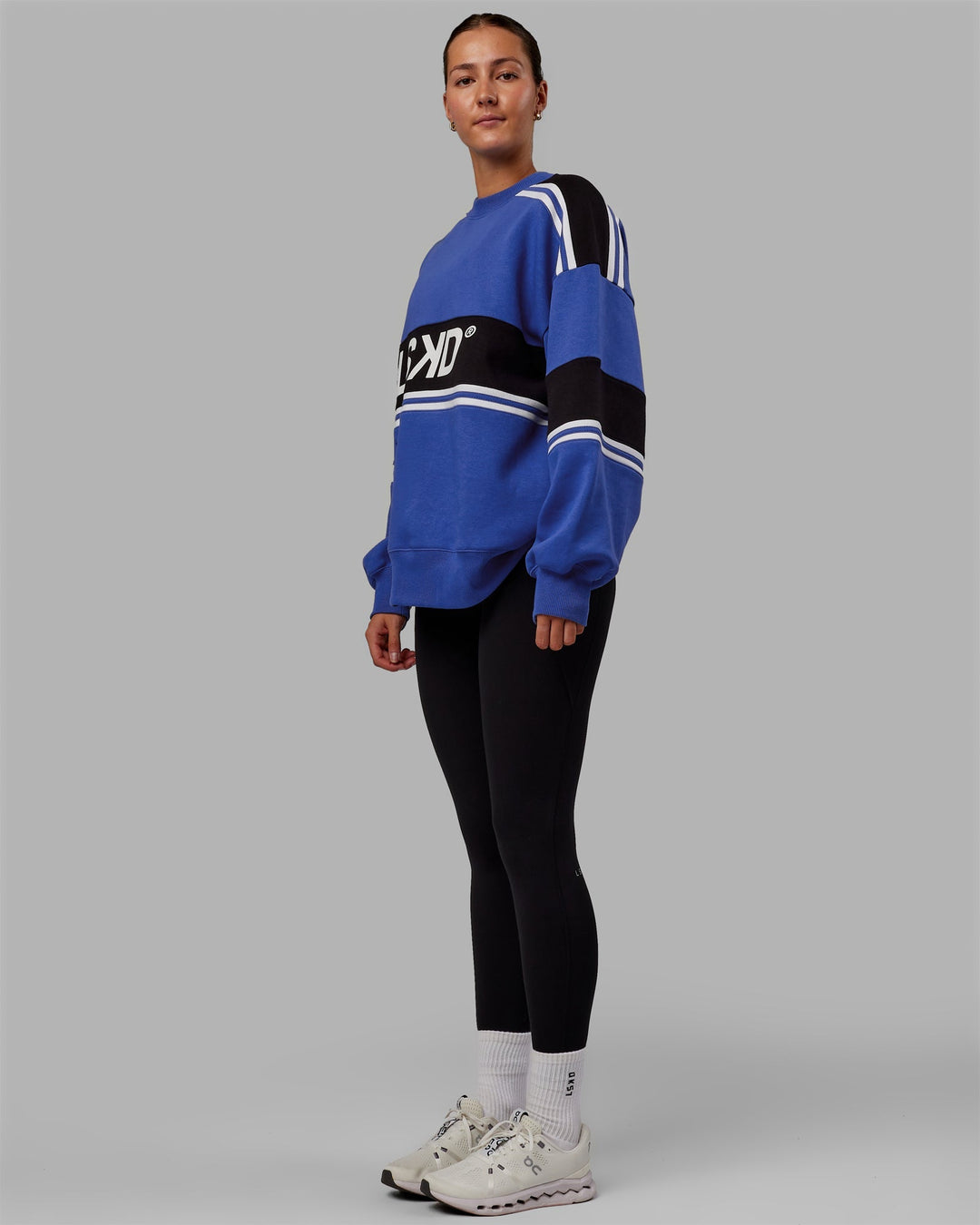 Woman wearing Unisex A-Team Sweater Oversize - Power Cobalt-Black