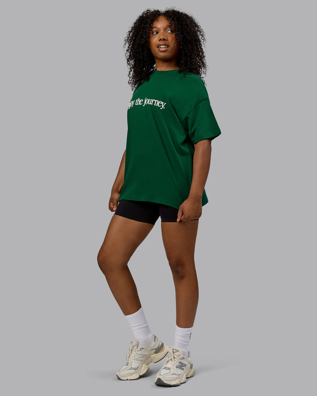 Woman wearing Unisex Enjoy The Journey Heavyweight Tee Oversize - Deep Emerald-Off-White