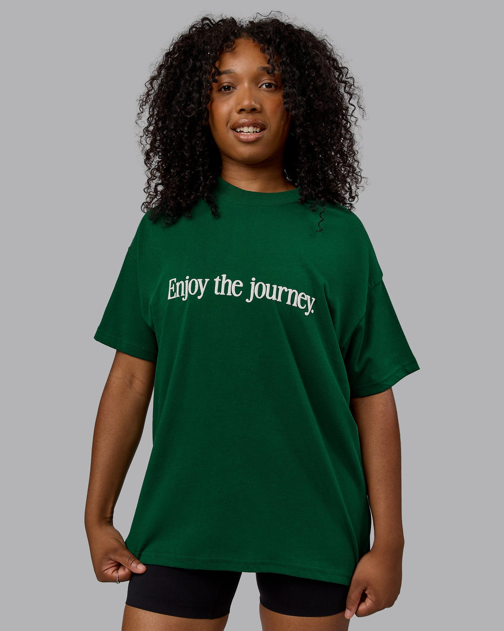 Woman wearing Unisex Enjoy The Journey Heavyweight Tee Oversize - Deep Emerald-Off-White