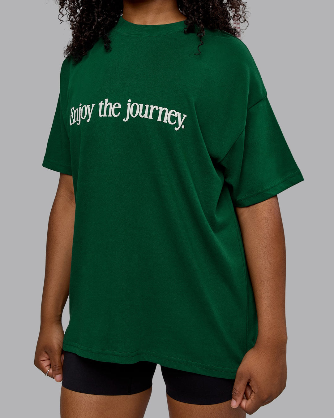 Woman wearing Unisex Enjoy The Journey Heavyweight Tee Oversize - Deep Emerald-Off-White