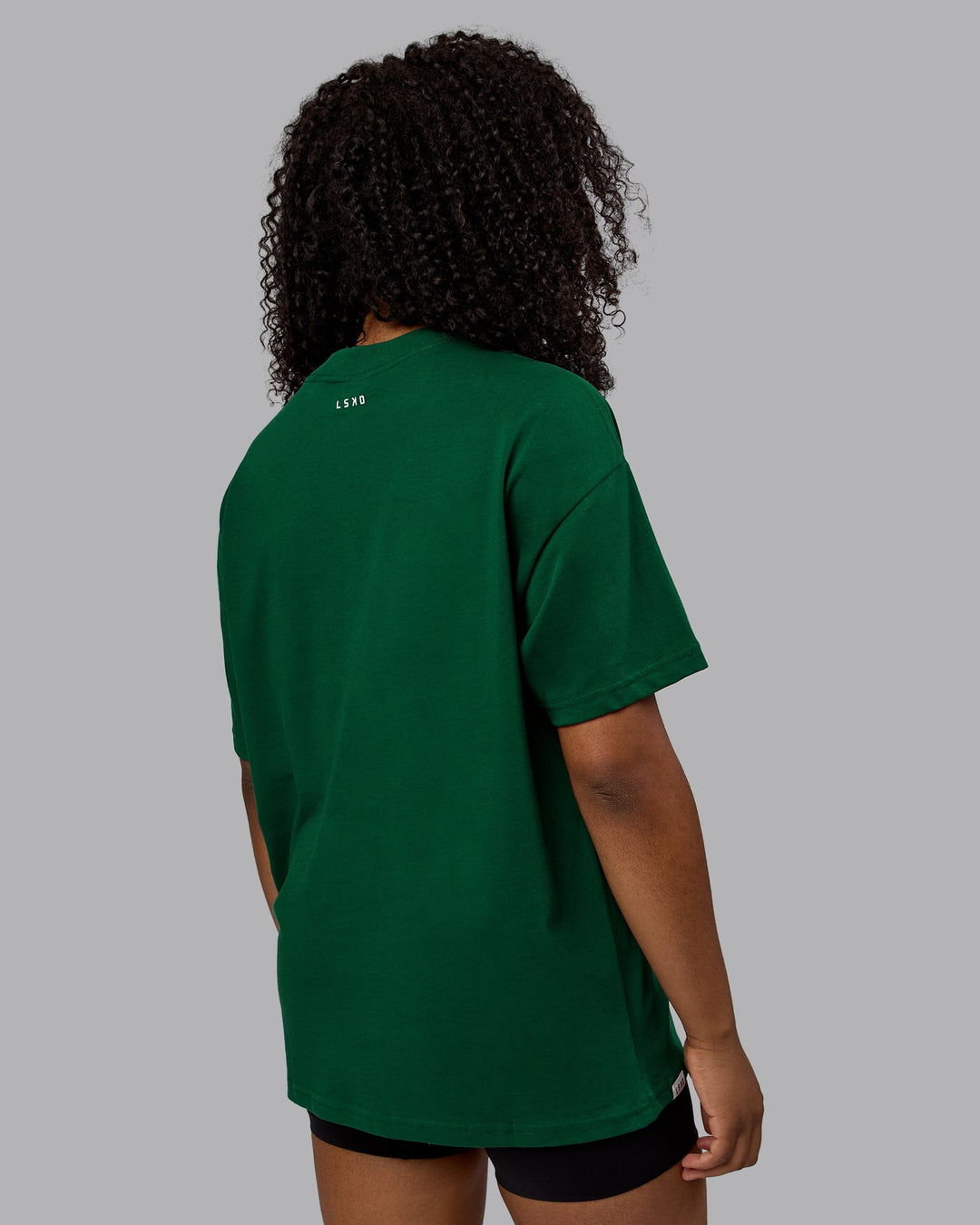 Woman wearing Unisex Enjoy The Journey Heavyweight Tee Oversize - Deep Emerald-Off-White