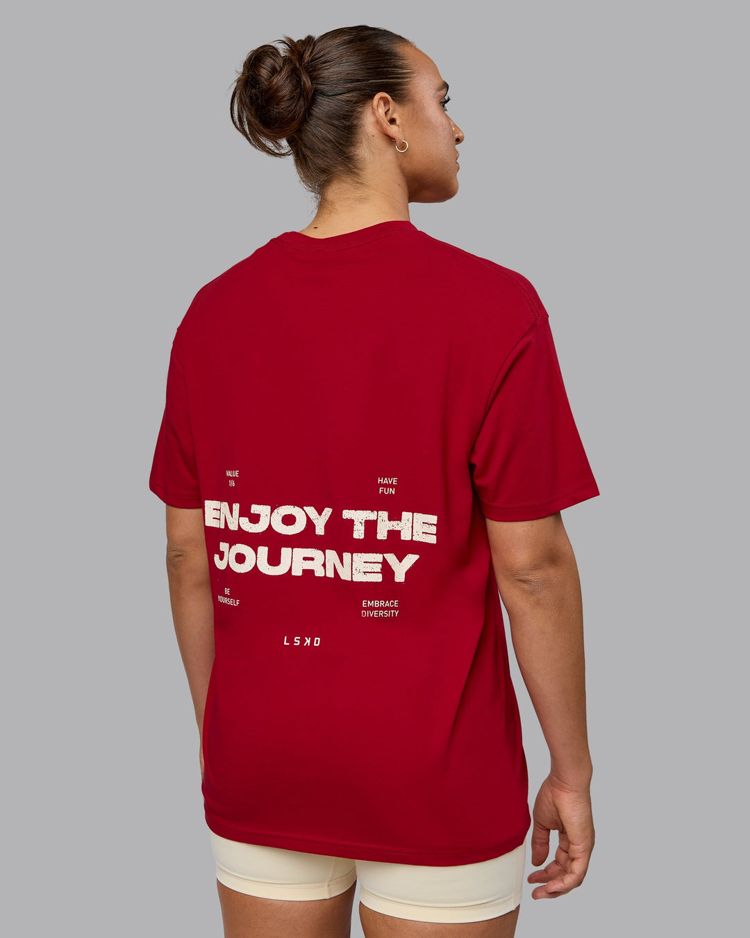 Woman wearing Unisex Enjoy the Journey Value Series FLXCotton Tee Oversize - Cherry Red-Ivory