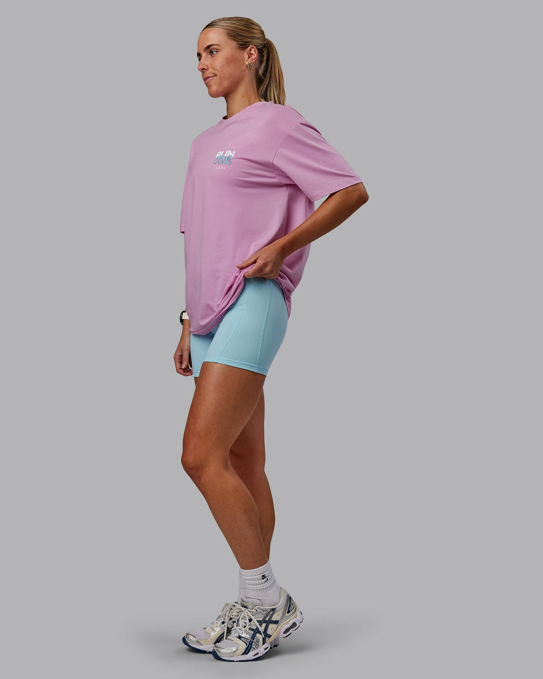 Woman wearing Unisex Gone Running FLXCotton Tee Oversize - Bubblegum-Skyride