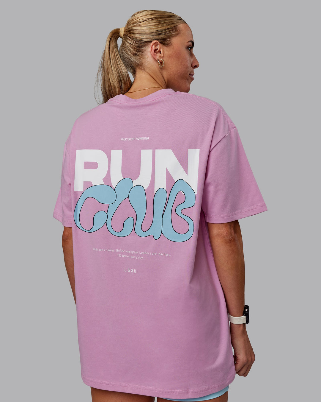 Woman wearing Unisex Gone Running FLXCotton Tee Oversize - Bubblegum-Skyride