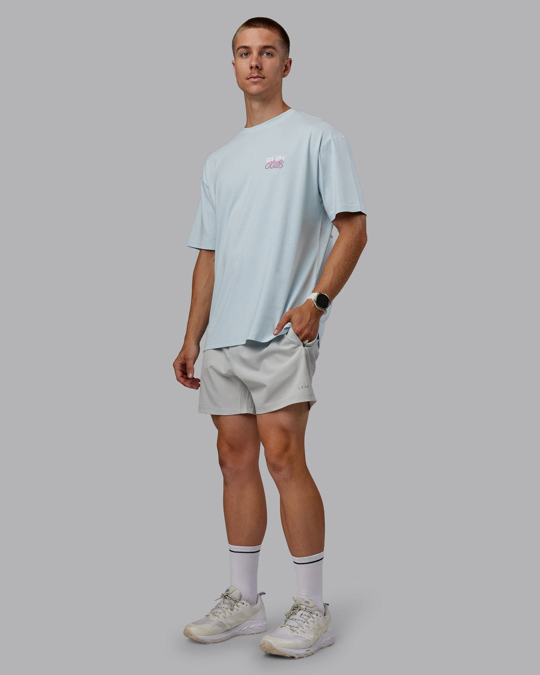 Man wearing Unisex Gone Running FLXCotton Tee Oversize - Skyride-Bubblegum