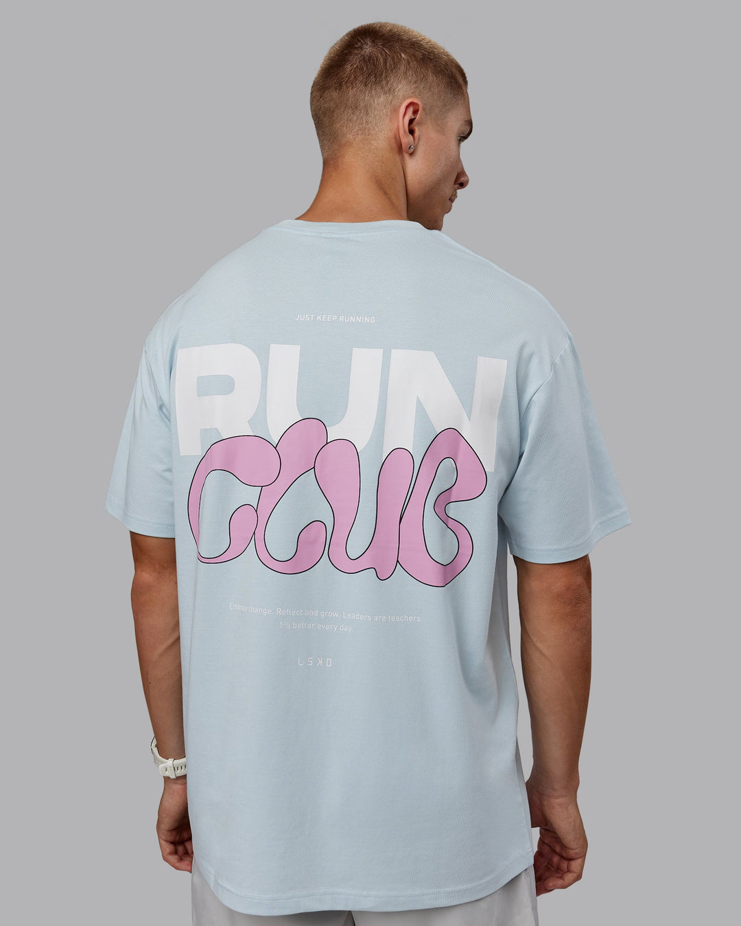 Man wearing Unisex Gone Running FLXCotton Tee Oversize - Skyride-Bubblegum