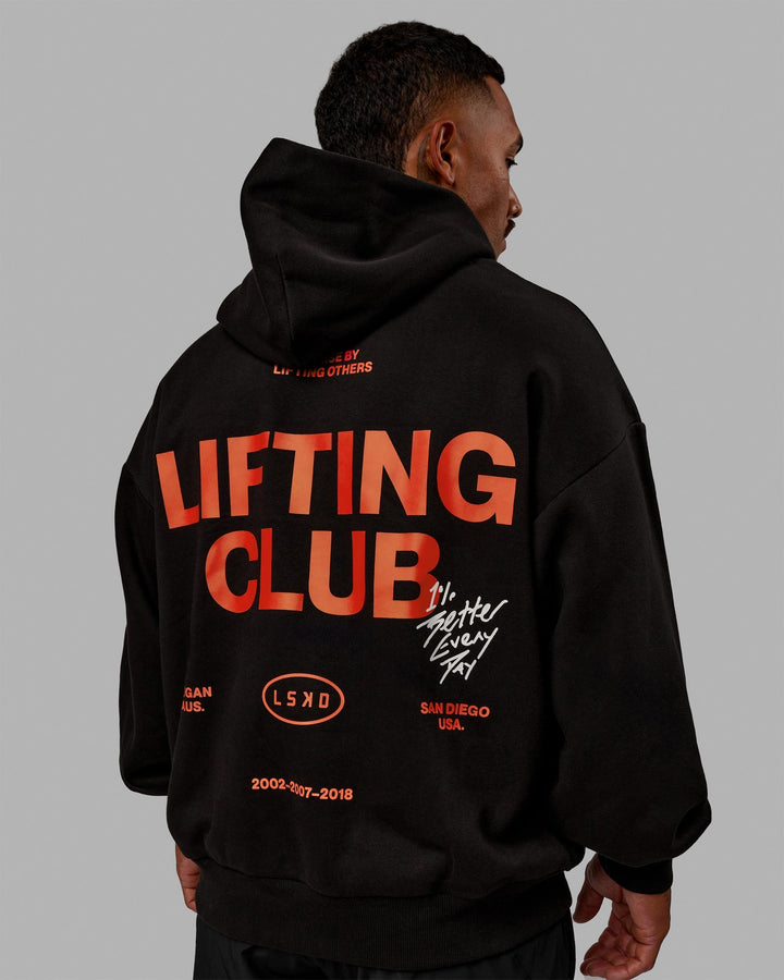 Man wearing Unisex Lifting Club Hoodie Oversize - Black-Red