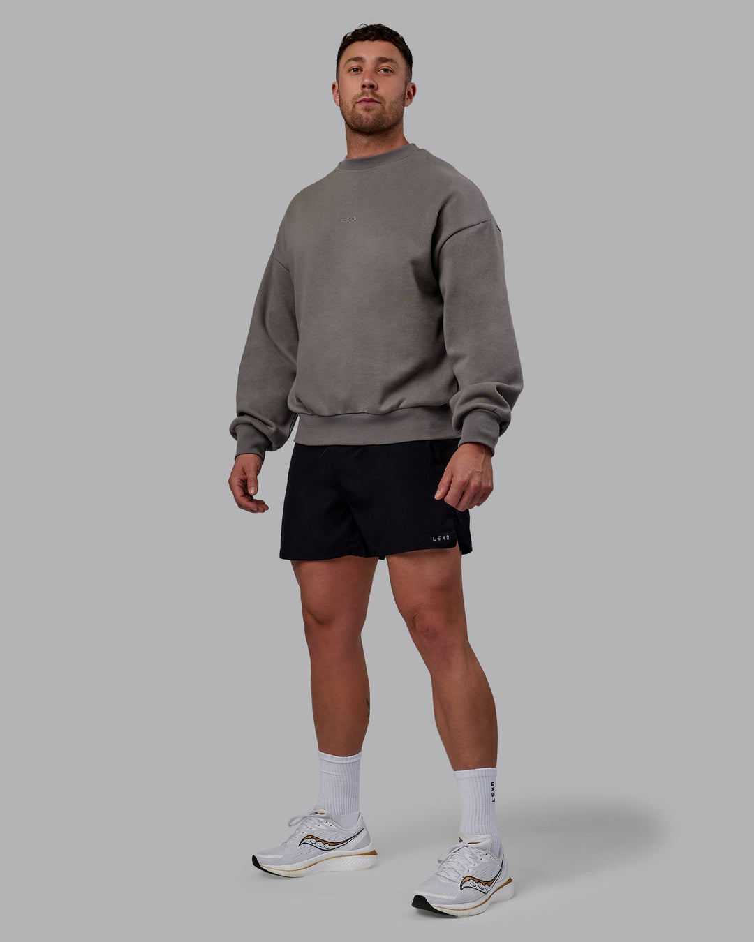 Man wearing Unisex MVP Sweater Oversize - Storm Front