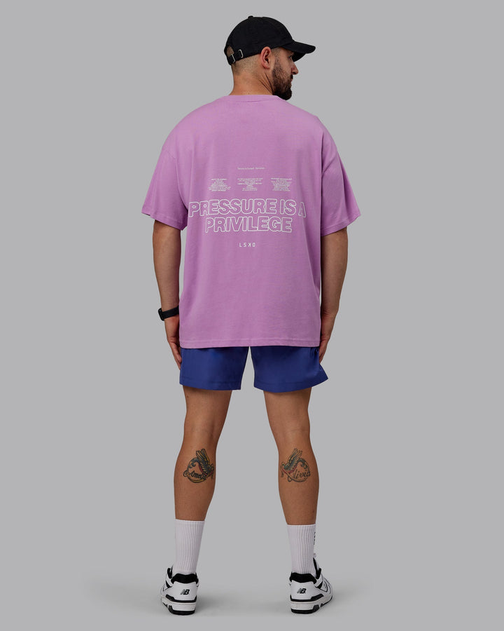 Man wearing Unisex Pressure Heavyweight Tee Oversize - Light Violet-White
