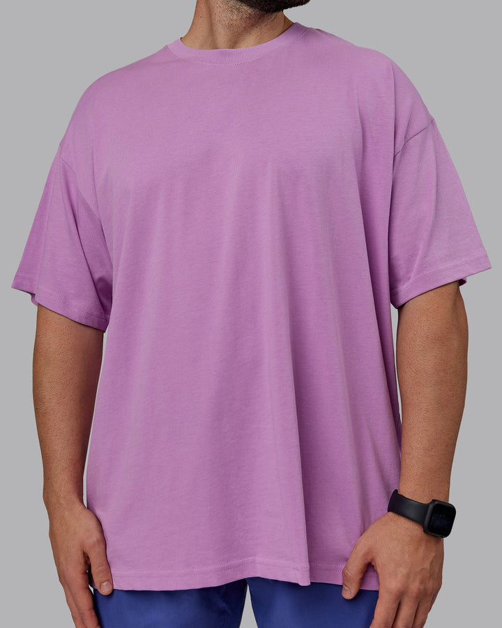 Man wearing Unisex Pressure Heavyweight Tee Oversize - Light Violet-White
