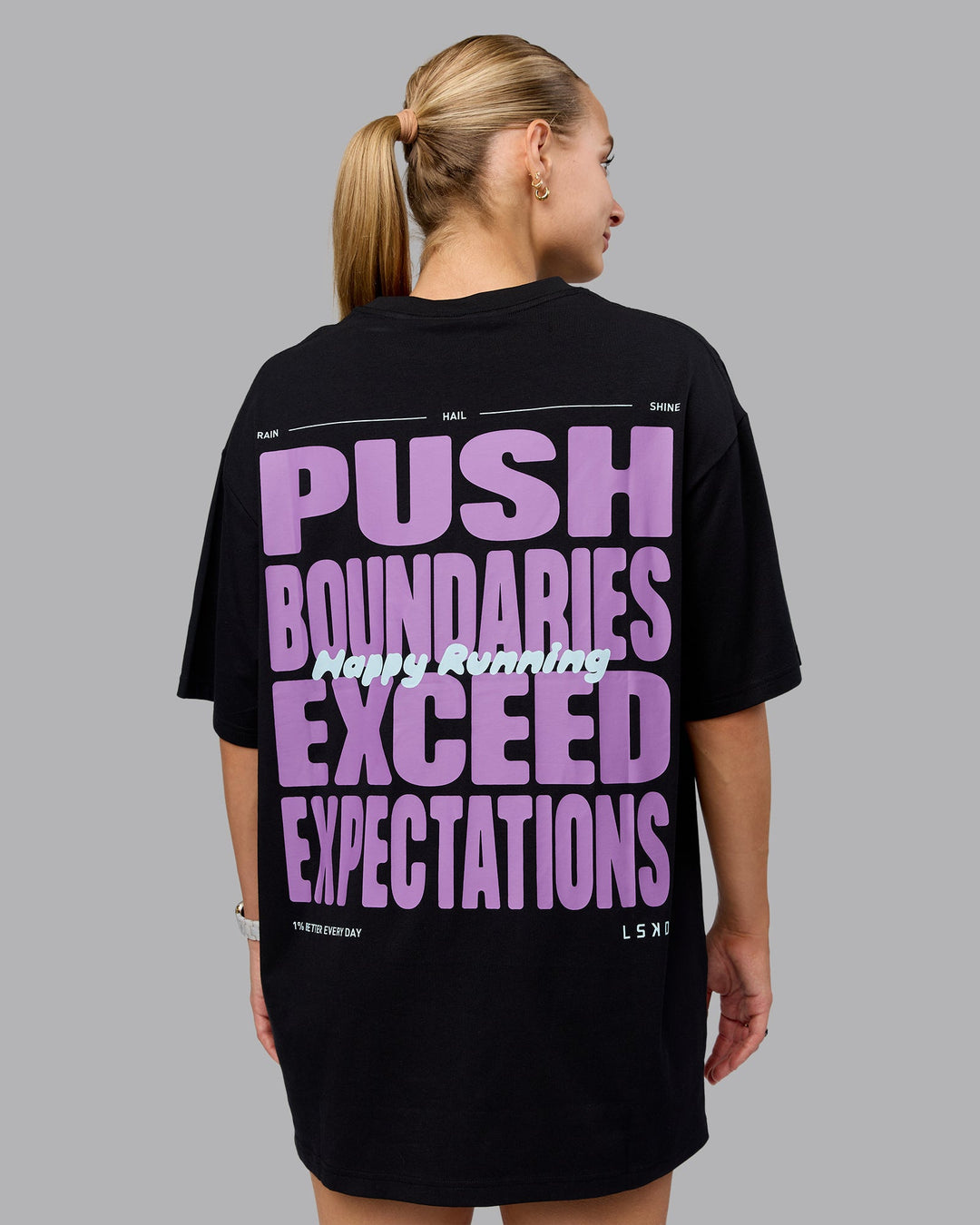 Woman wearing Unisex Push Boundaries FLXCotton Tee Oversize - Black-Purple Swirl