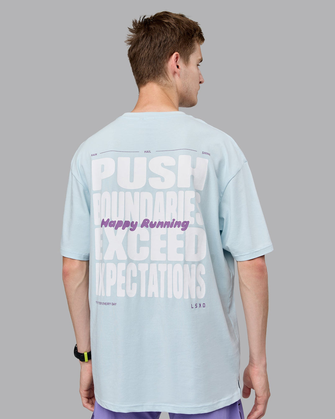 Man wearing Unisex Push Boundaries FLXCotton Tee Oversize - Light Cyan-White