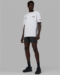 Man wearing Unisex Redline FLXCotton Tee Oversize - White-Navy