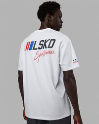 Man wearing Unisex Redline FLXCotton Tee Oversize - White-Navy