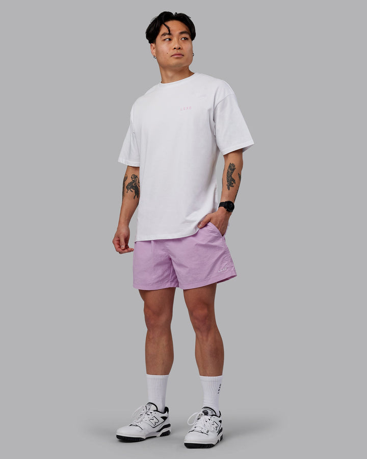 Man wearing Unisex Strike Through FLXCotton Tee Oversize - White-Bubblegum
