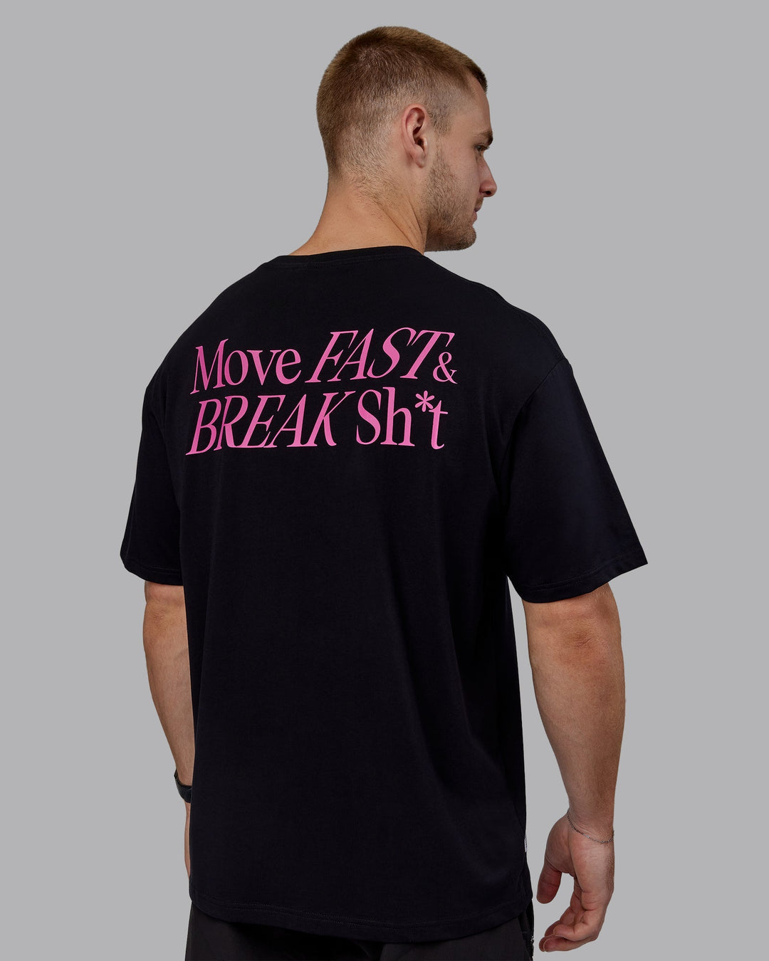 Man wearing Unisex VS5 FLXCotton Tee Oversize - Black-Fuschia Pink