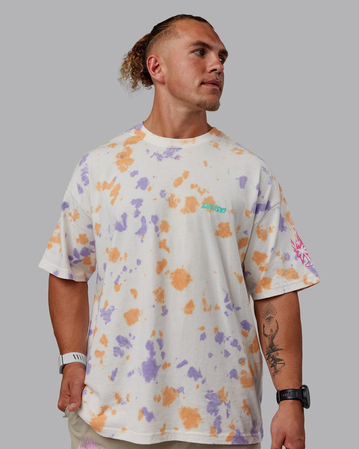 Man wearing Unisex Washed Huntington 24 Heavyweight Tee Oversize - Tie Dye Tangerine-Dahlia Purple
