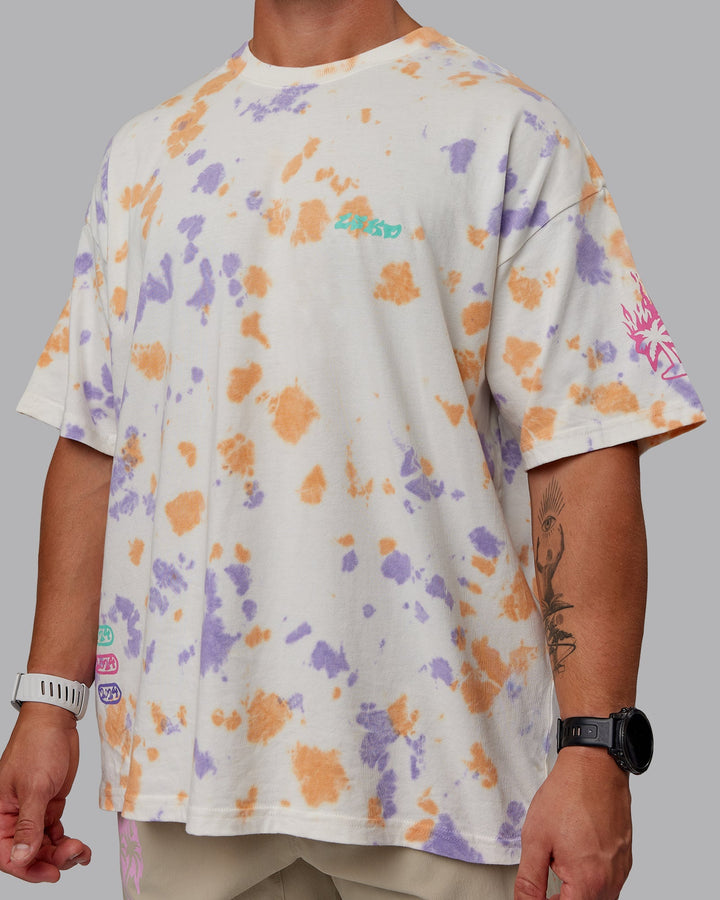 Man wearing Unisex Washed Huntington 24 Heavyweight Tee Oversize - Tie Dye Tangerine-Dahlia Purple
