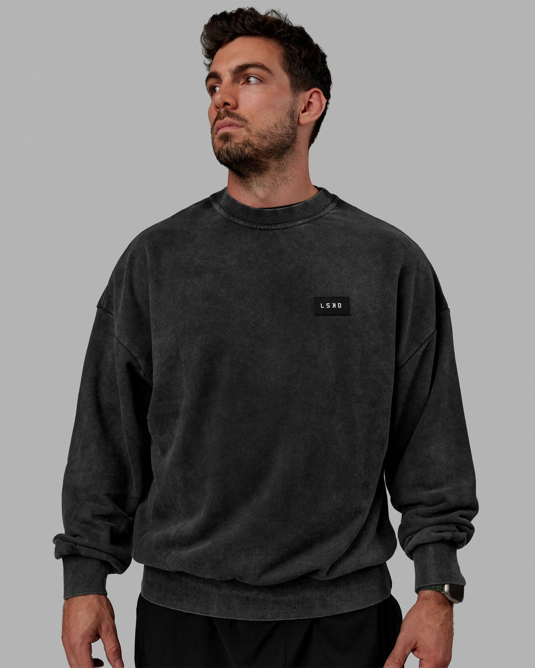Man wearing Unisex Washed Segmented Sweater Oversize - Black