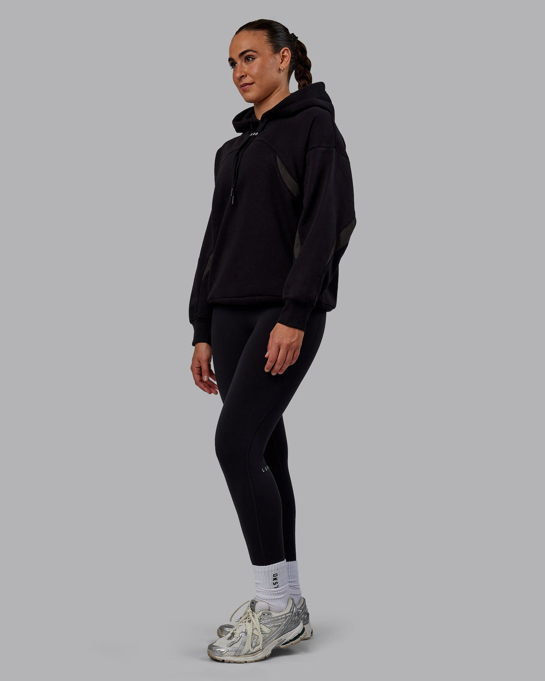 Woman wearing Unisex Y2K Concept Panel Hoodie - Black-Black-Pirate Black