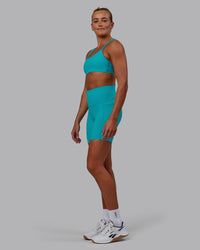 Woman wearing Vantage Sports Bra - Blue Bird