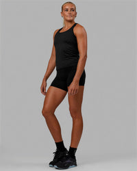 Woman wearing AeroFLX+ Seamless Tank - Black Marl