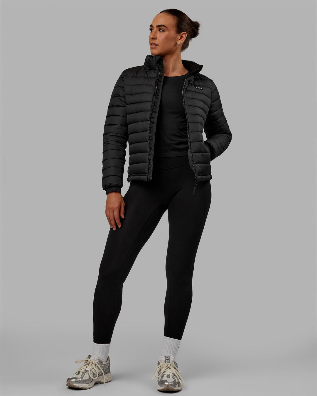 Woman wearing All Day Puffer Jacket - Black