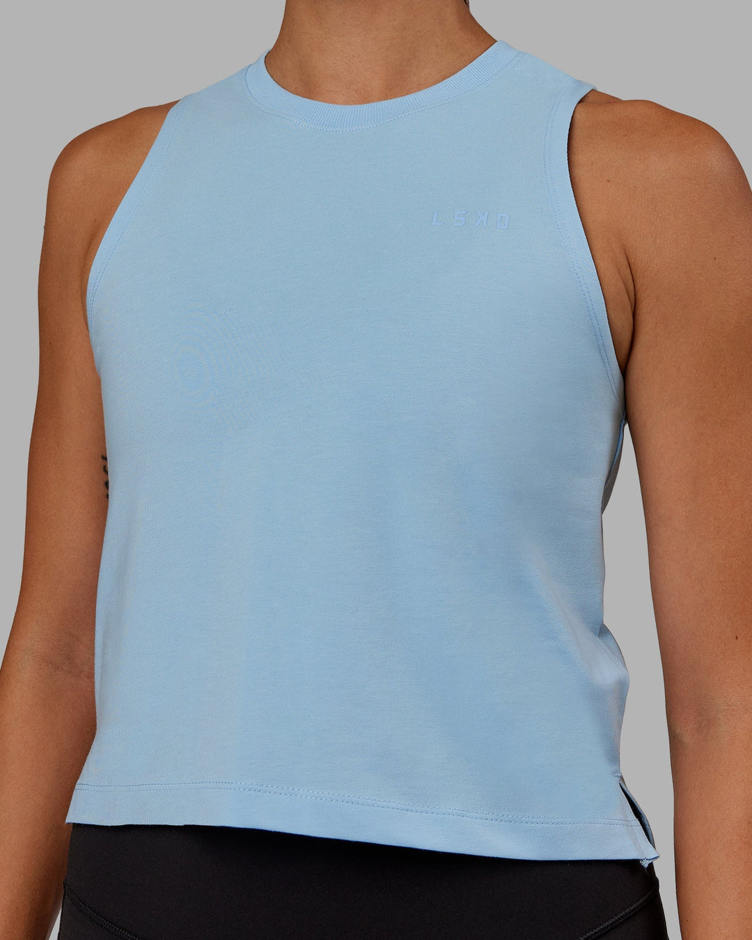 Woman wearing Deluxe PimaFLX Tank - Glacial Blue