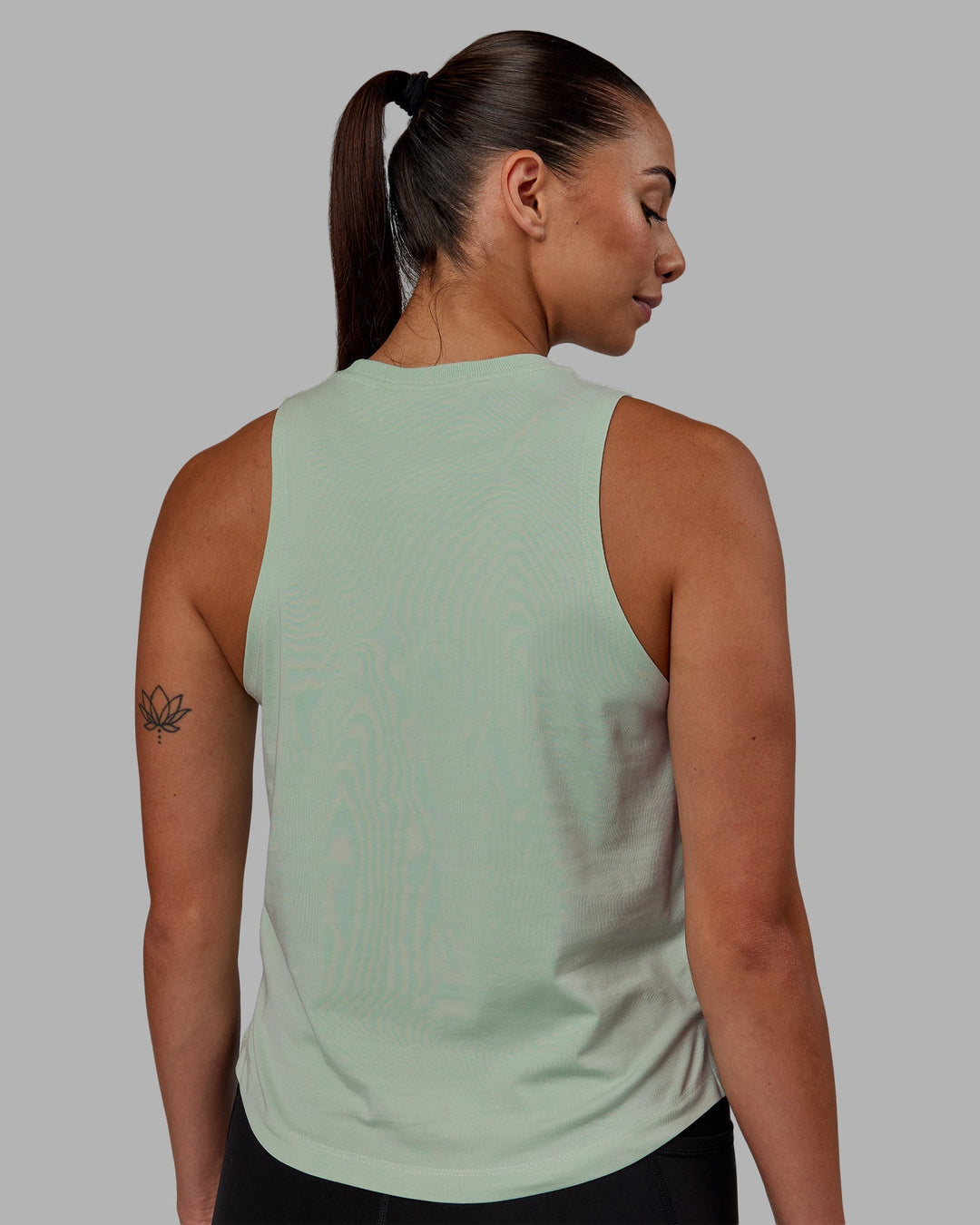 Woman wearing Deluxe PimaFLX Tank - Surf Spray