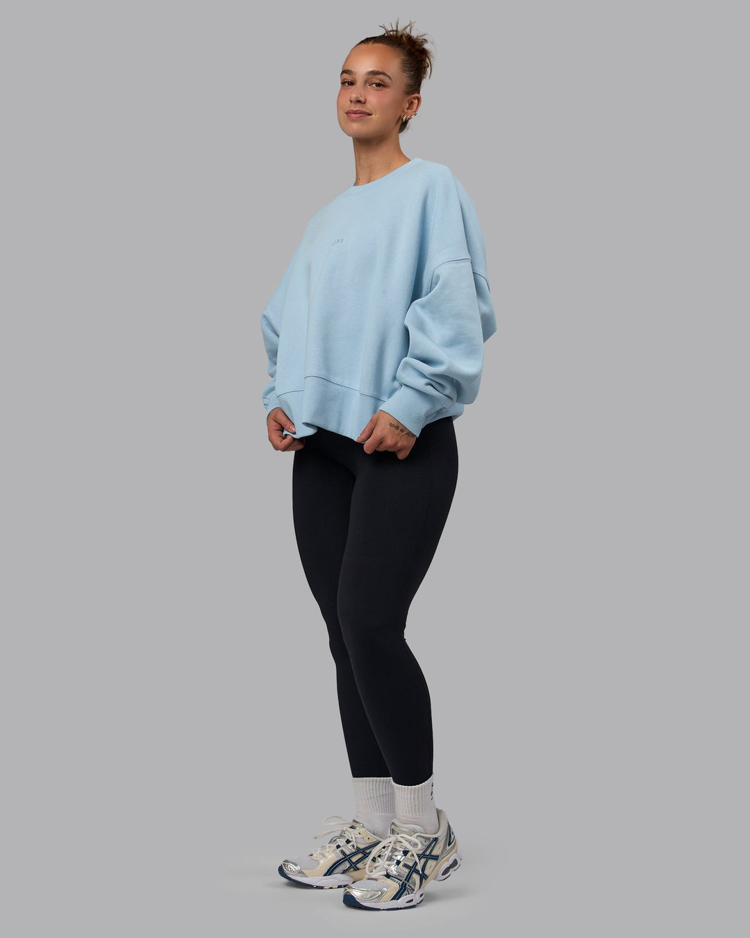 Woman wearing MVP Oversized Sweater - Glacial Blue