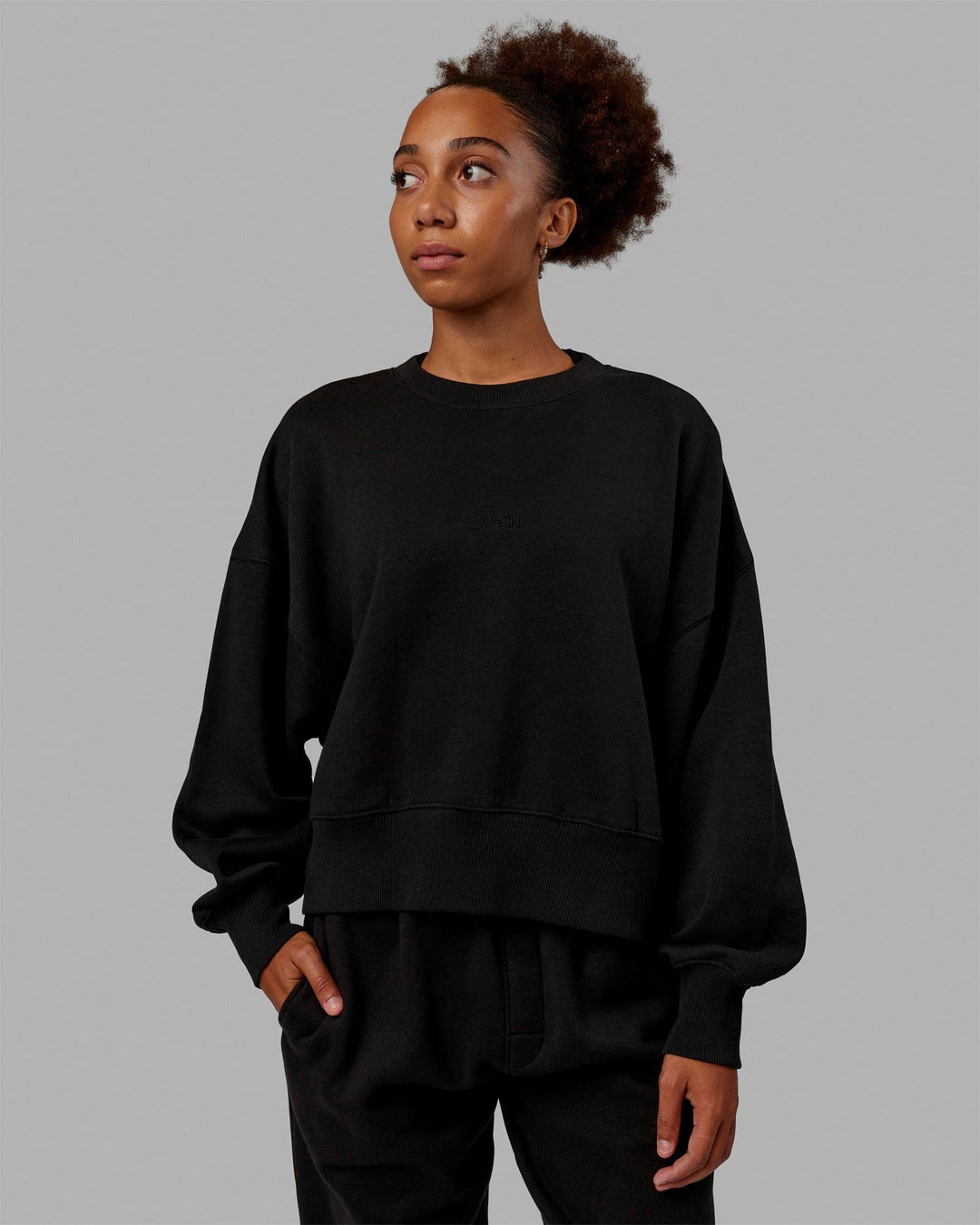 Woman wearing MVP Oversized Sweater - Black