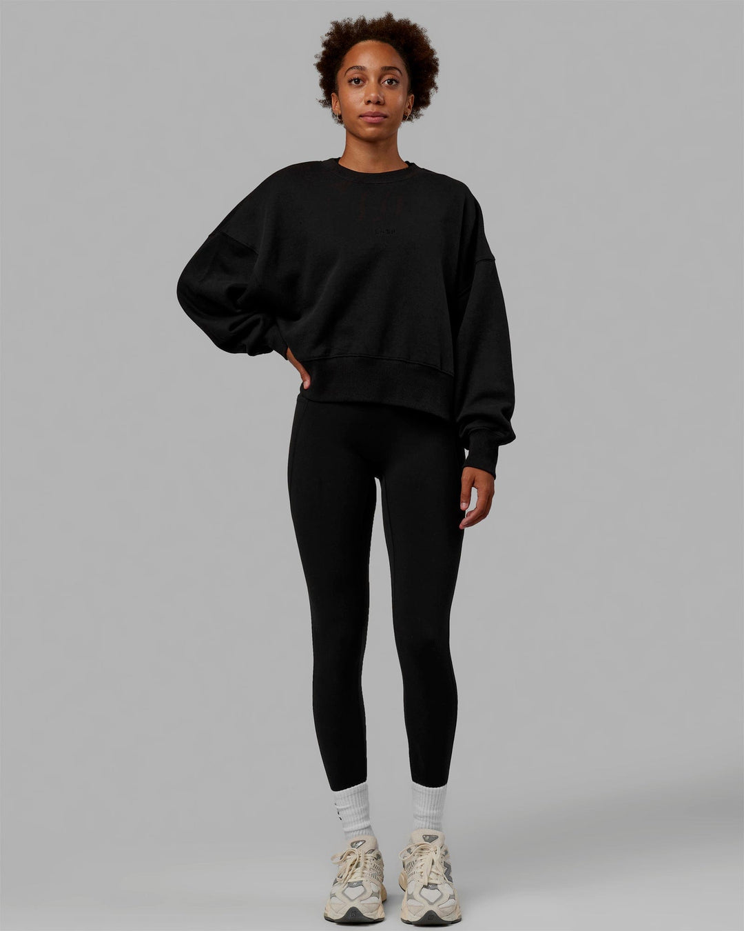 Woman wearing MVP Oversized Sweater - Black