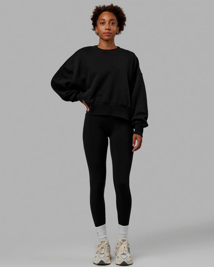 Woman wearing MVP Oversized Sweater - Black
