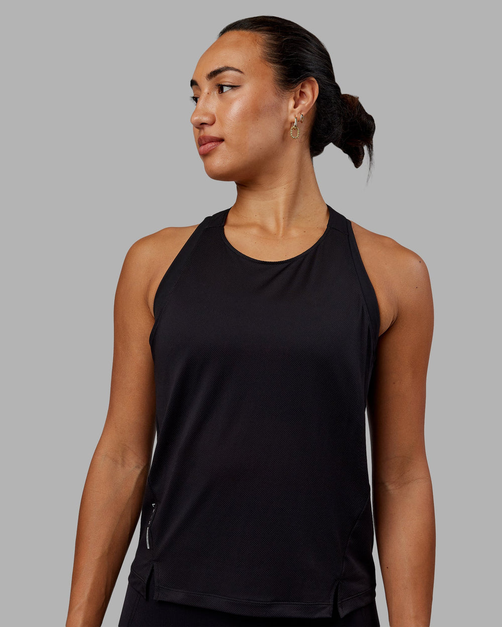 Woman wearing Pace Running Tank - Black