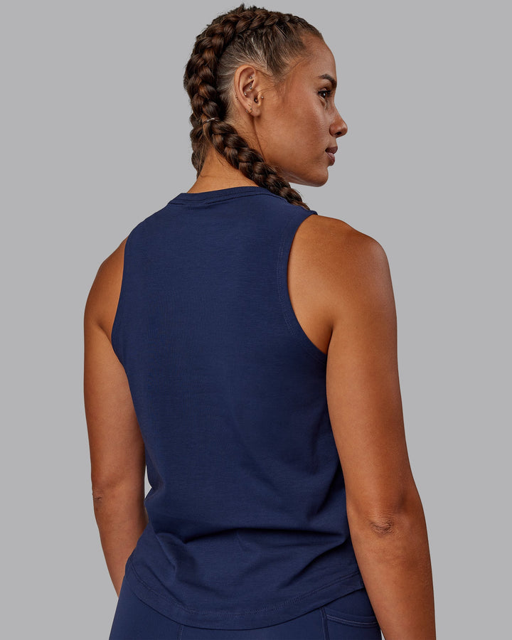 Woman wearing Deluxe PimaFLX Tank - Future Navy
