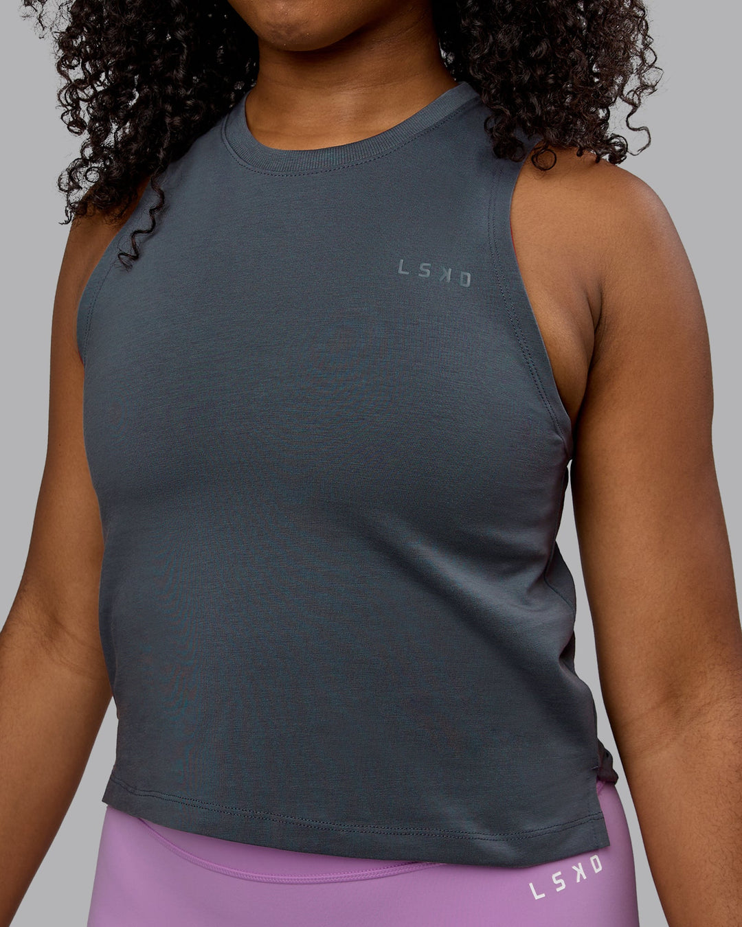 Woman wearing Deluxe PimaFLX Tank - Turbulence