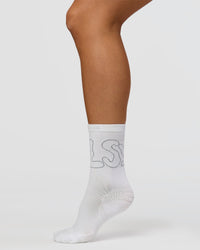 Motion Performance Crew Socks in White-Reflective