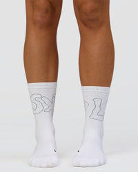 Motion Performance Crew Socks in White-Reflective
