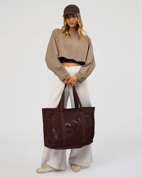 Woman wearing CF Move Through Tote - Hot Chocolate | Model:Leilani