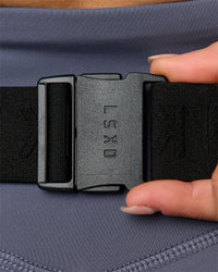 Woman wearing Pace Run Belt - Black-Reflective
